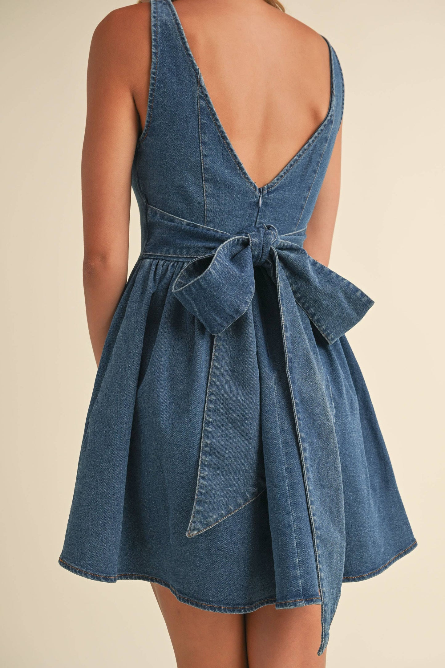 ID8595 DENIM BACK BOW CHEVRON WAIST FLARED MINI DRESS