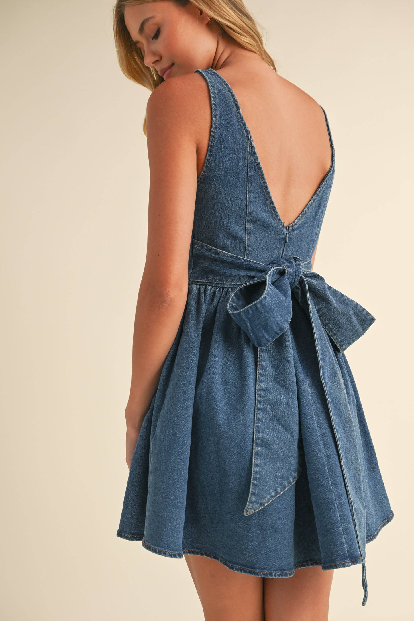 ID8595 DENIM BACK BOW CHEVRON WAIST FLARED MINI DRESS